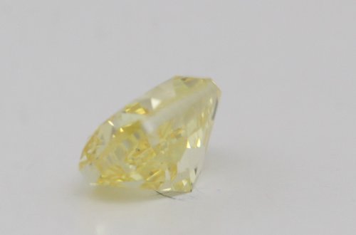 Oval Cut Loose Diamond (0.8 Ct,Fancy Vivid Yellow Color,Si1